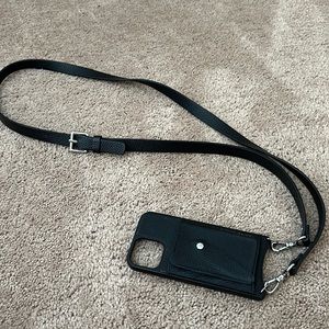 Bandolier Haley for iPhone 12 Pro.  In black pebble leather with silver hardware
